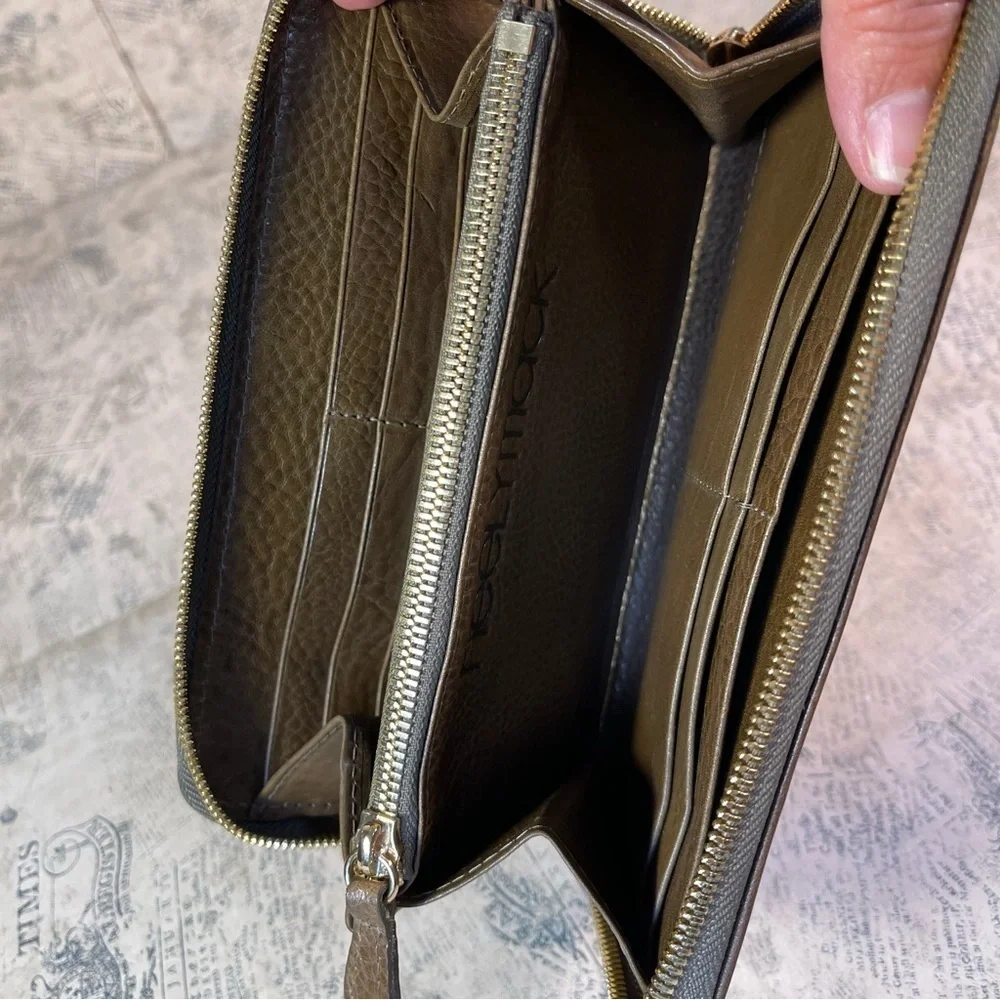Neely Mack San Francisco zipper around brown leather wallet